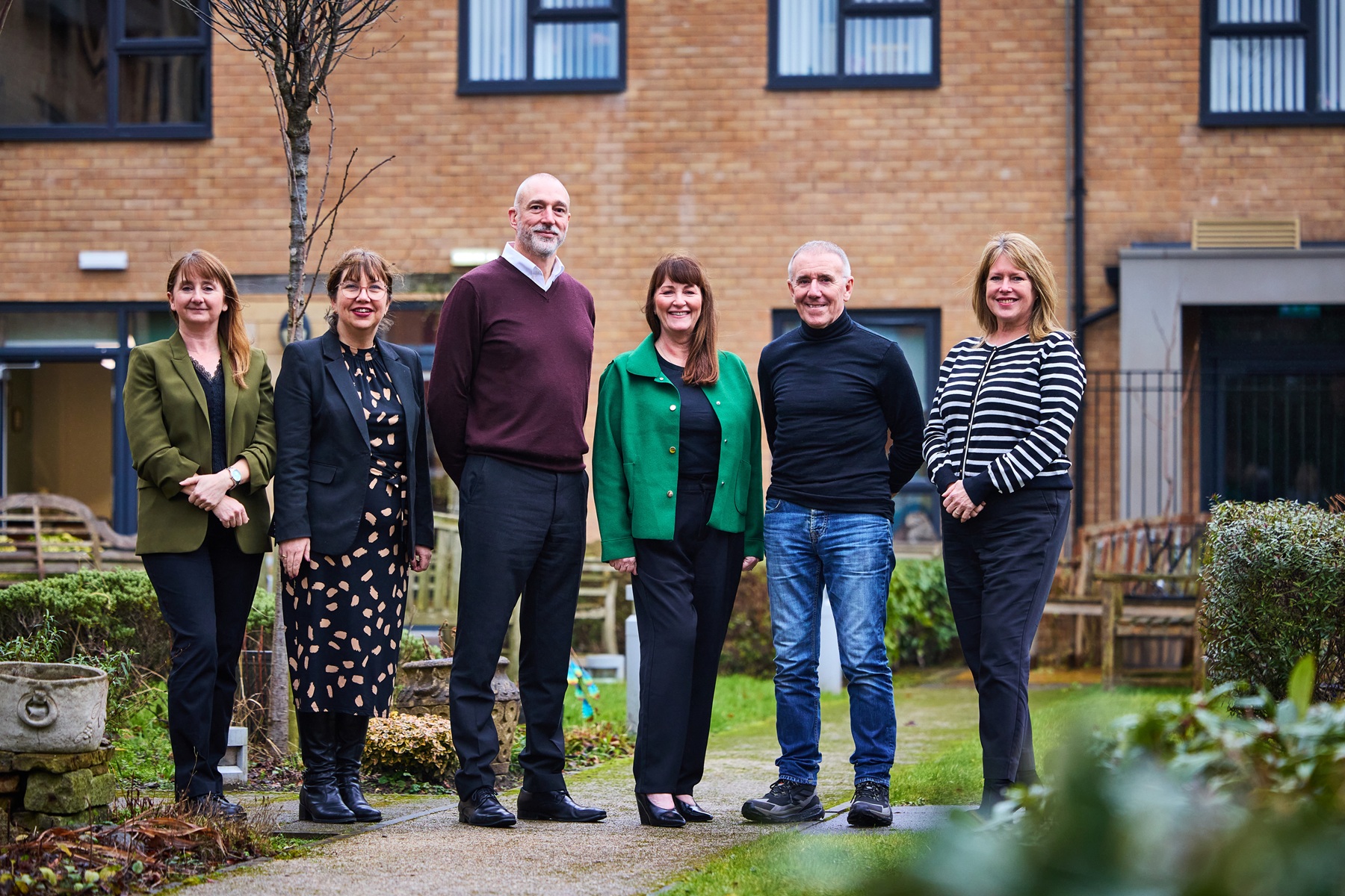 Group photo of the RBH executive team at Hare Hill with Principality Building Society representatives