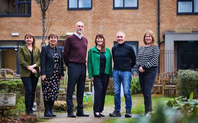Group photo of the RBH executive team at Hare Hill with Principality Building Society representatives