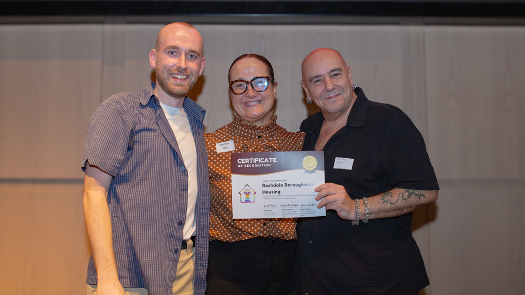 RBH Strategic Lead Rachael Ray receives RBH's Pledge Pioneer certificate from the HouseProud team